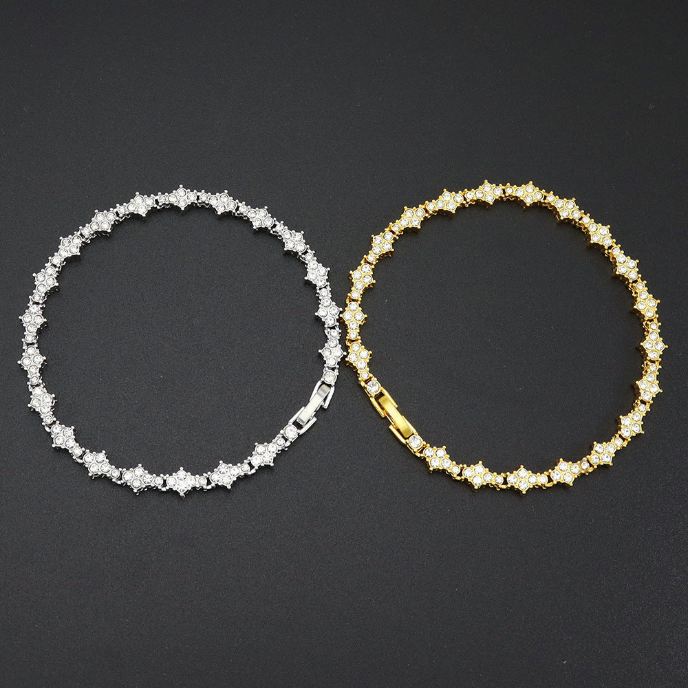 Klassieke tennisarmband met clusters | witgoudkleurig