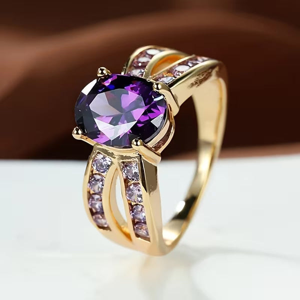 Goudkleurige amethist ring met gesplitste band