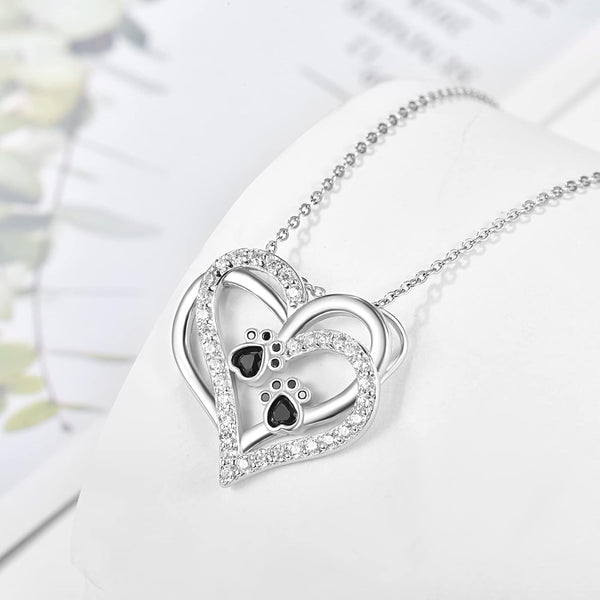Ketting met hondenpootje in hart met zirkonia