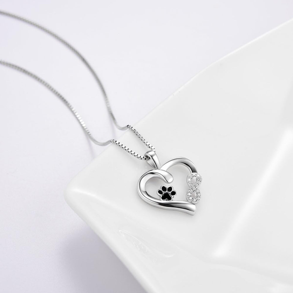 Ketting met pootje, hartje en infinity-bedel