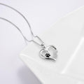 Ketting met pootje, hartje en infinity-bedel