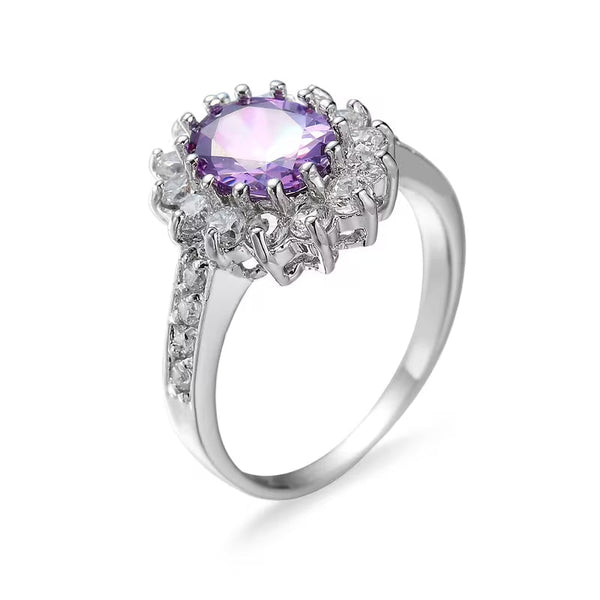 Zilverkleurige kroonring met amethistpaarse steen
