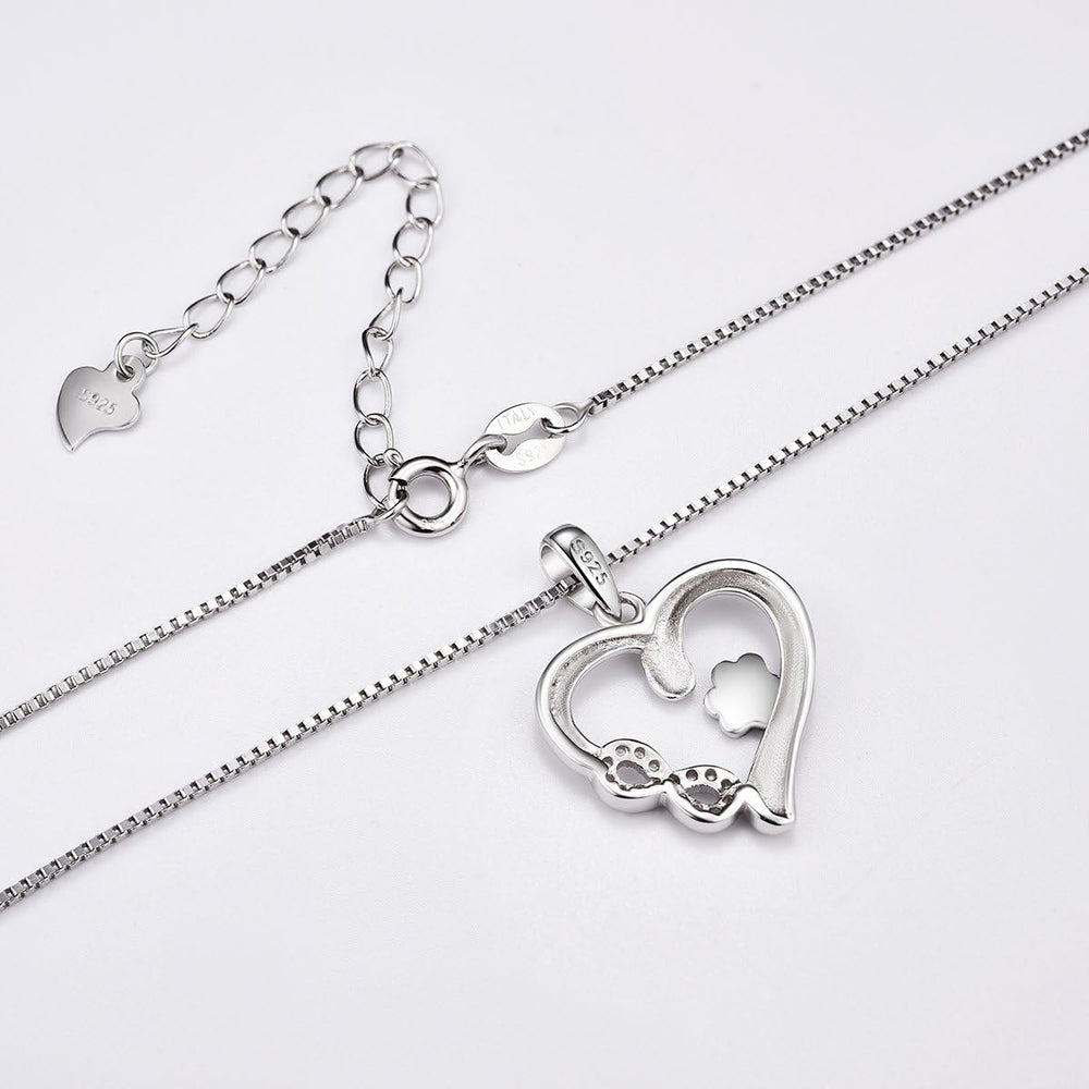 Ketting met pootje, hartje en infinity-bedel