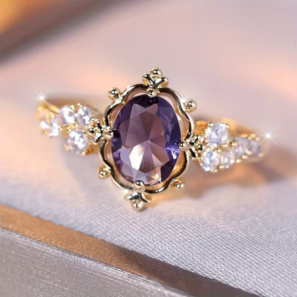 Goudkleurige prinsessenring met amethist