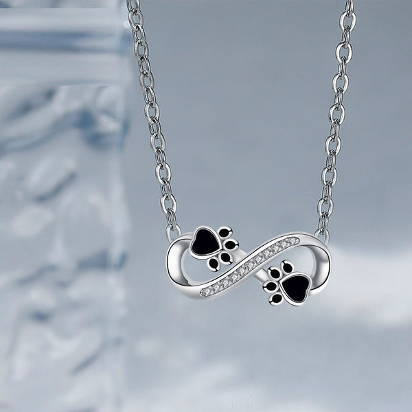 Infinity ketting met pootje en zirkonia