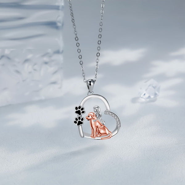 Hartvormige ketting met hond en meisje