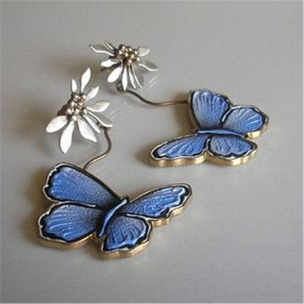 Vintage blauwe vlinderoorbellen