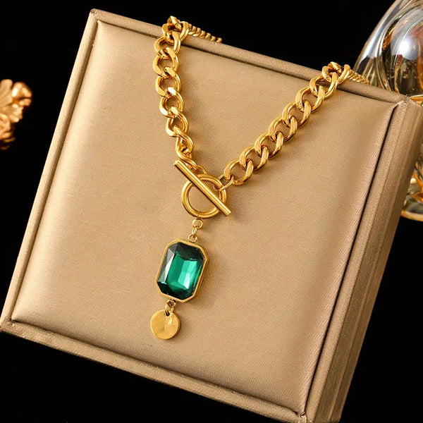 Grove schakelketting met smaragdgroene hanger | goudkleurig