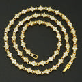 Klassieke cluster tennisketting | goudkleurig