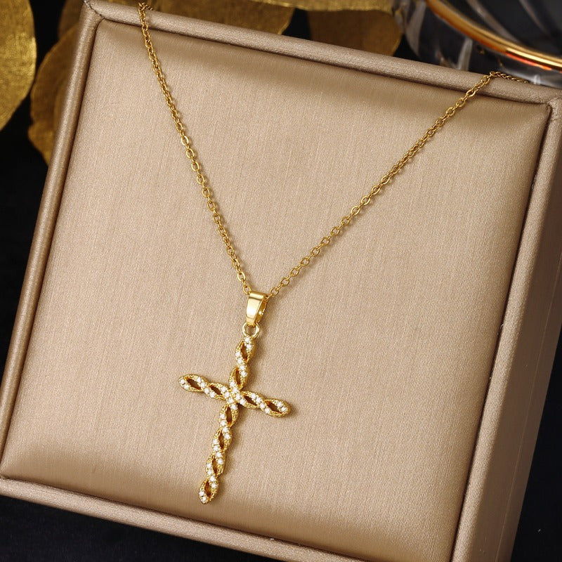 Kristallen gedraaide kruisketting | goudkleurig