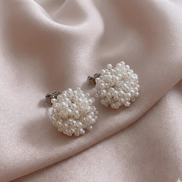 Elegante oorbellen met ingelegde parels