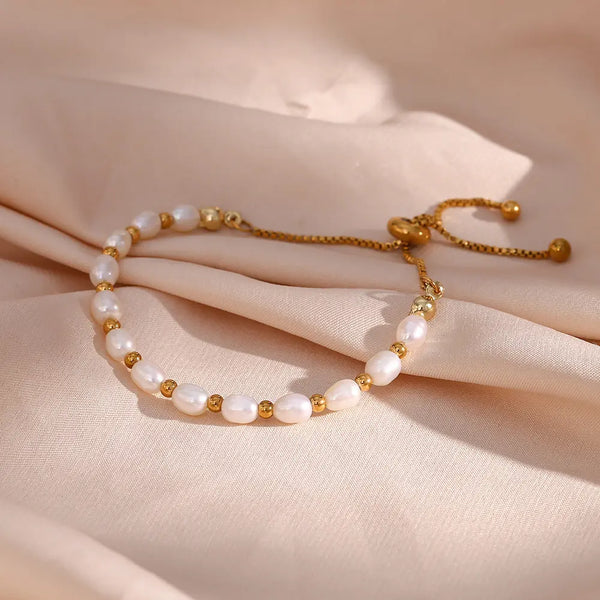 Elegante armband met parels en goudkleurige kraaltjes