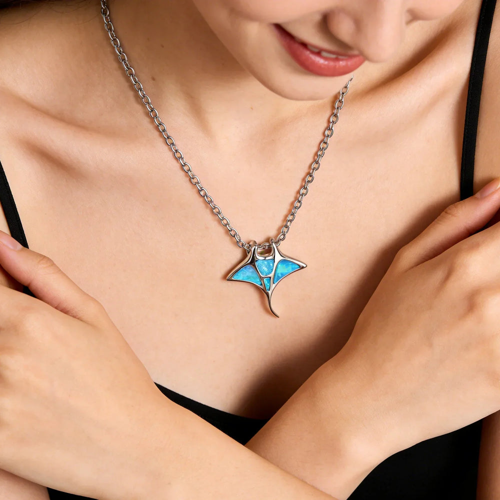 Mantarog ketting met blauwe opaal-look