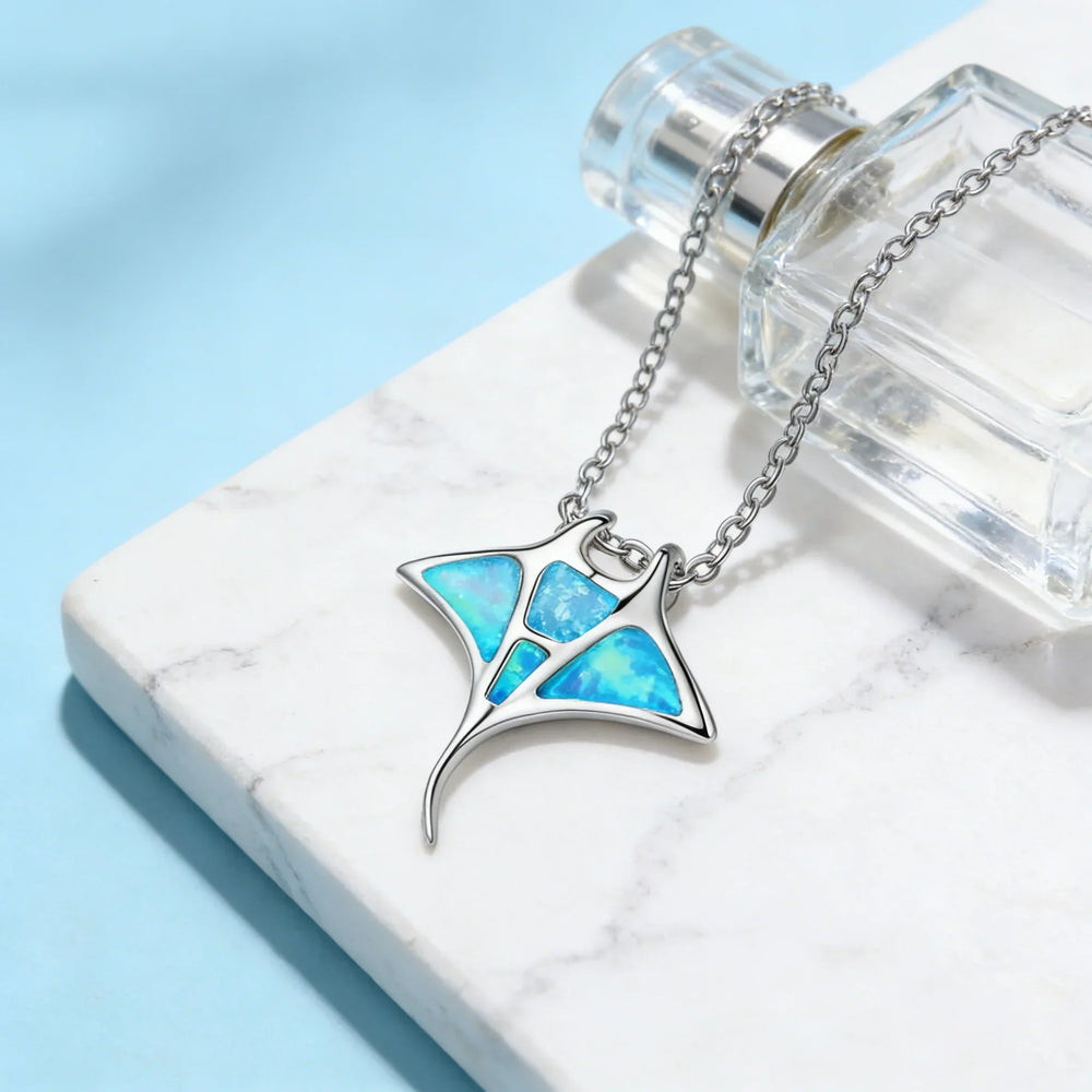Mantarog ketting met blauwe opaal-look