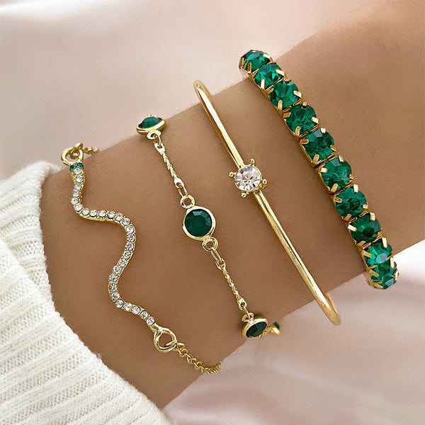Goudkleurige smaragd armbandenset