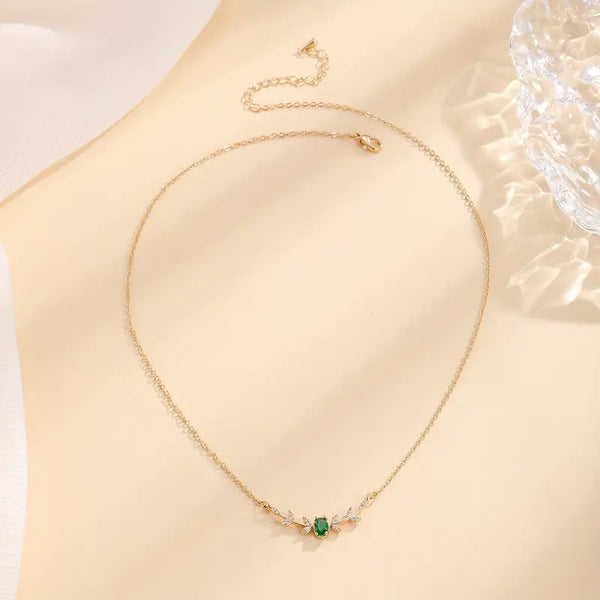 Goudkleurige minimalistische smaragd ketting