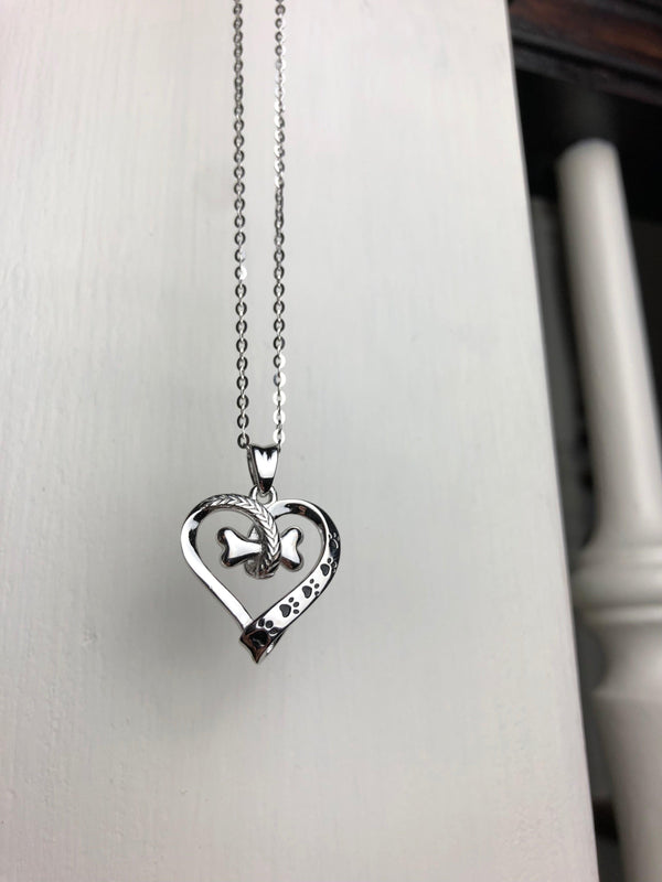 Ketting met hondenpootje en hartje in roestvrij staal