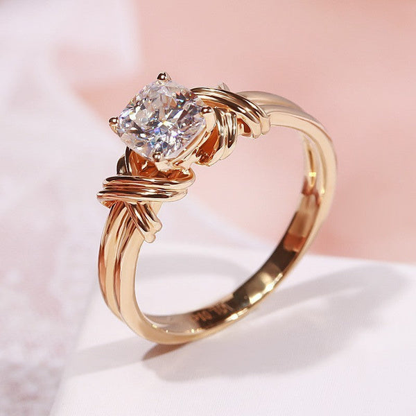 Opvallende ring met geknoopte strengen | goudkleurig