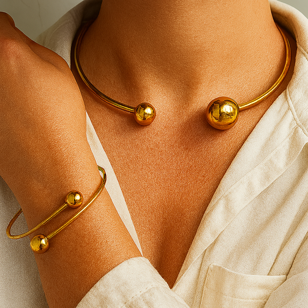 Minimalistische Glow set van spang en klemarmband | goudkleurig