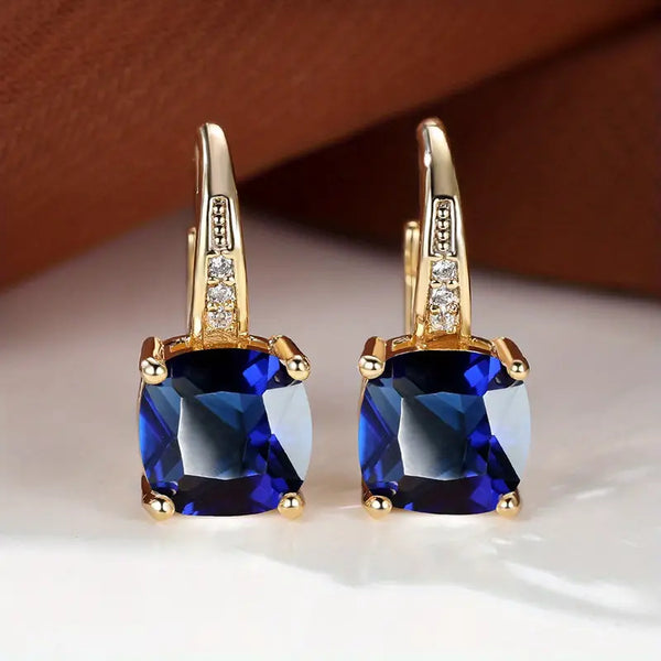 Mystic Sapphire oorringen met steen | goudkleurig