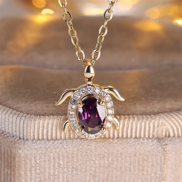 Ketting met schildpadhanger van paars kristal