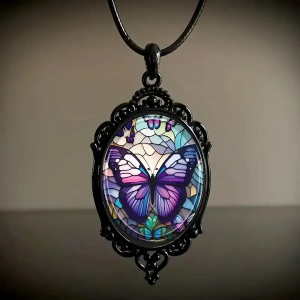 Vlinderhanger aan ketting met paars kristal