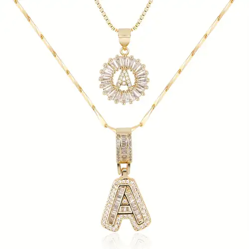 Kettingset met letter in pavé | goudkleurig