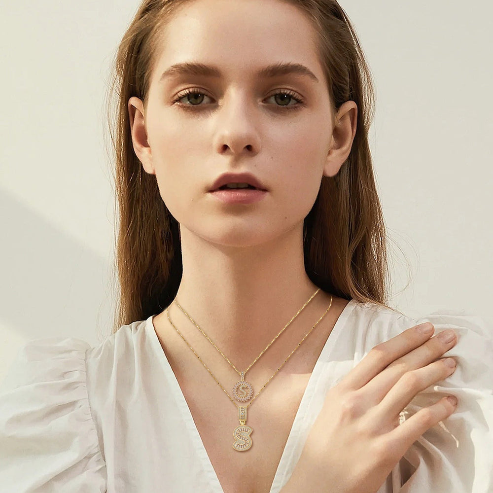 Kettingset met letter in pavé | goudkleurig