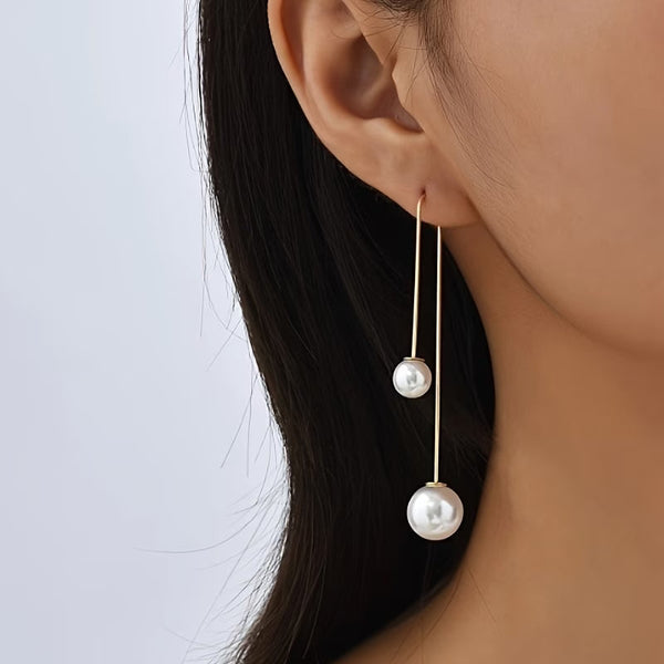 Radiant statement oorbellen met parels