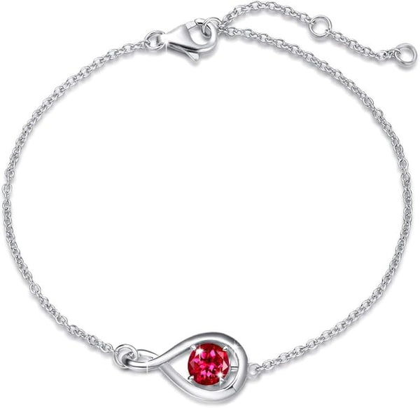 Infinity armband met robijnrood steentje | witgoudkleurig