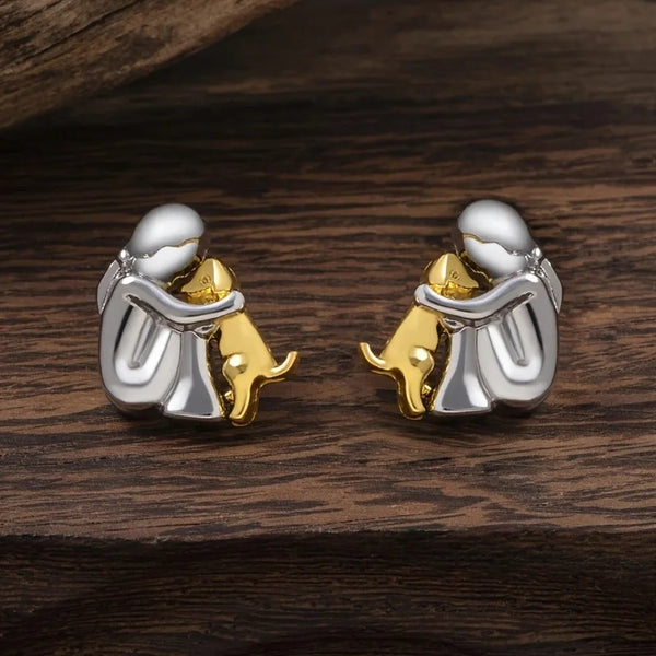 Zilver- en goudkleurige knuffel oorbellen
