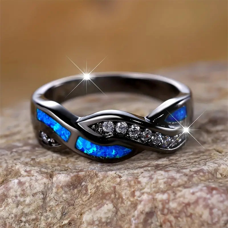 Zilverkleurige gedraaide ring met inleg