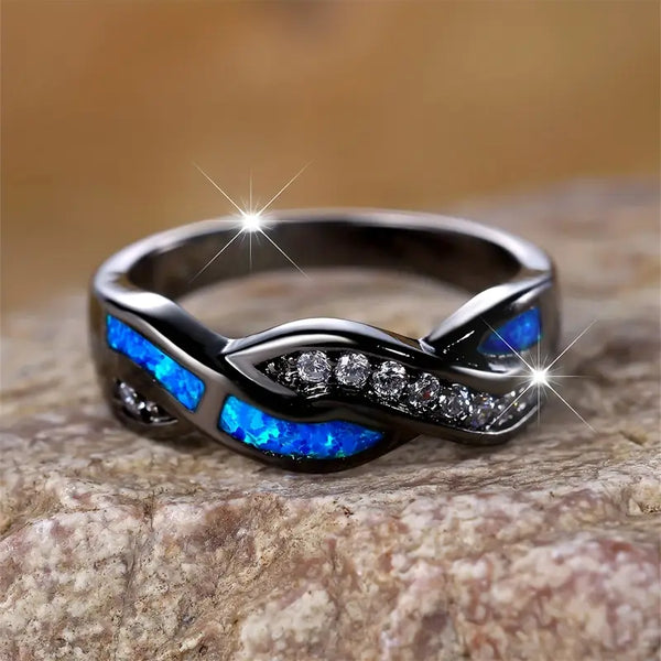 Zilverkleurige gedraaide ring met inleg