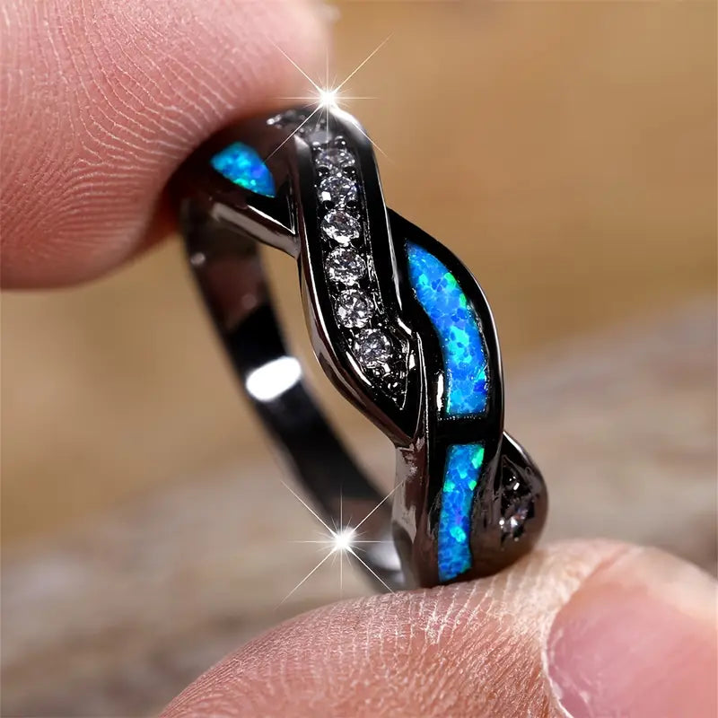 Zilverkleurige gedraaide ring met inleg