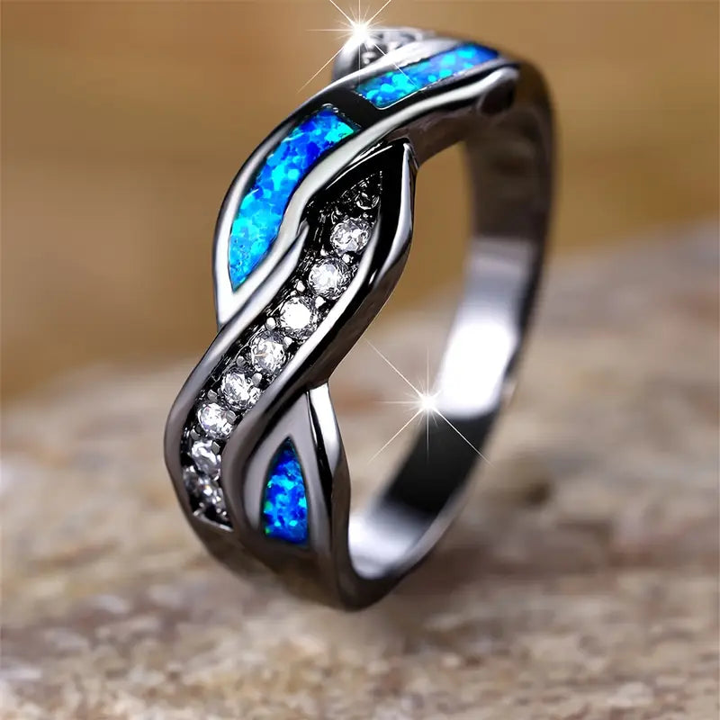 Zilverkleurige gedraaide ring met inleg