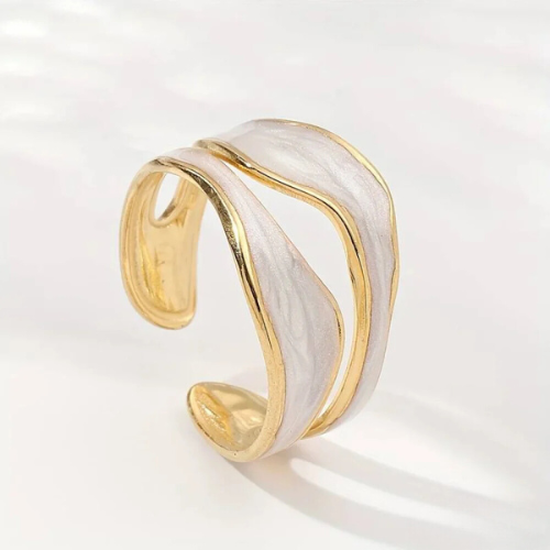 Zilver- en goudkleurige sculpturale open ring
