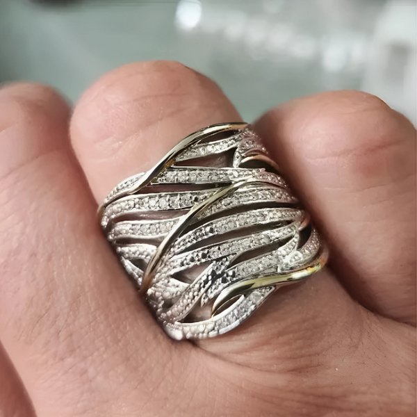 Gevlochten ring in zilver- en goudkleur