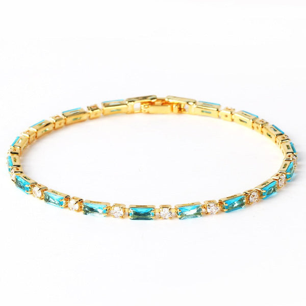 Armband met turquoise steentjes | goudkleurig