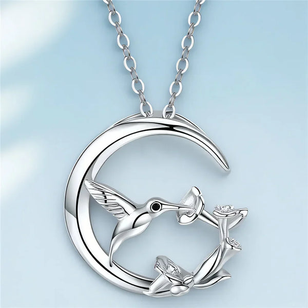 Maan en vogel – vintage zilveren ketting met hanger
