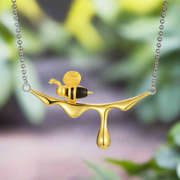 Ketting met druppende honing & bij