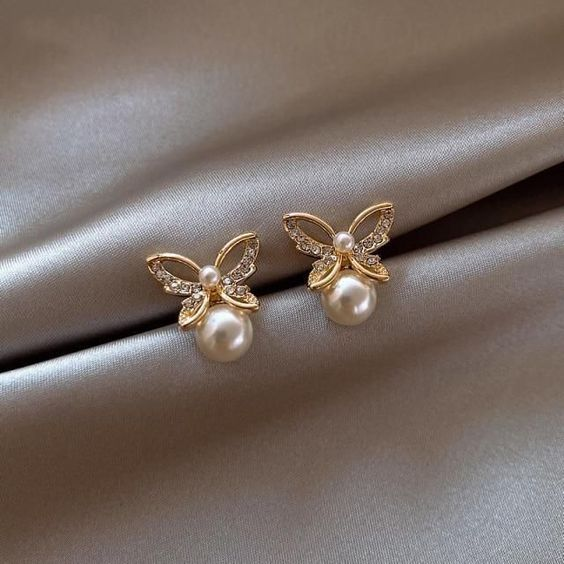 Vintage vlinderoorbellen met parel