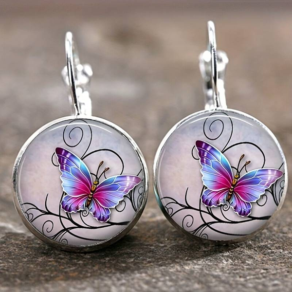 Vintage ronde vlinderoorbellen met kristal